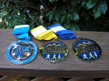 Photo of Morgan Hill Marathon medals by Angela Young